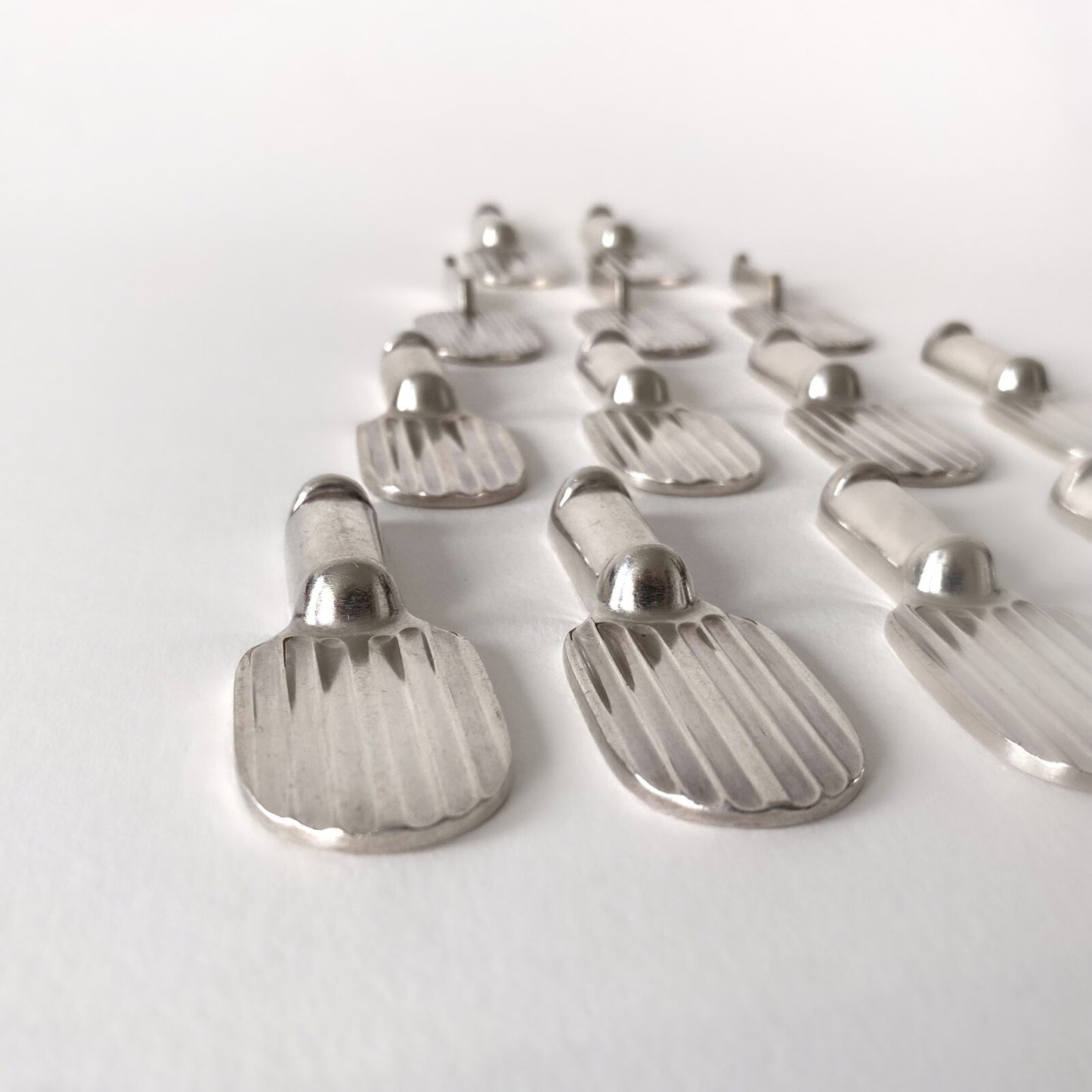 14 porte-couteaux Art Déco "Raquette" par Luc Lanel pour Christofle - 1930s