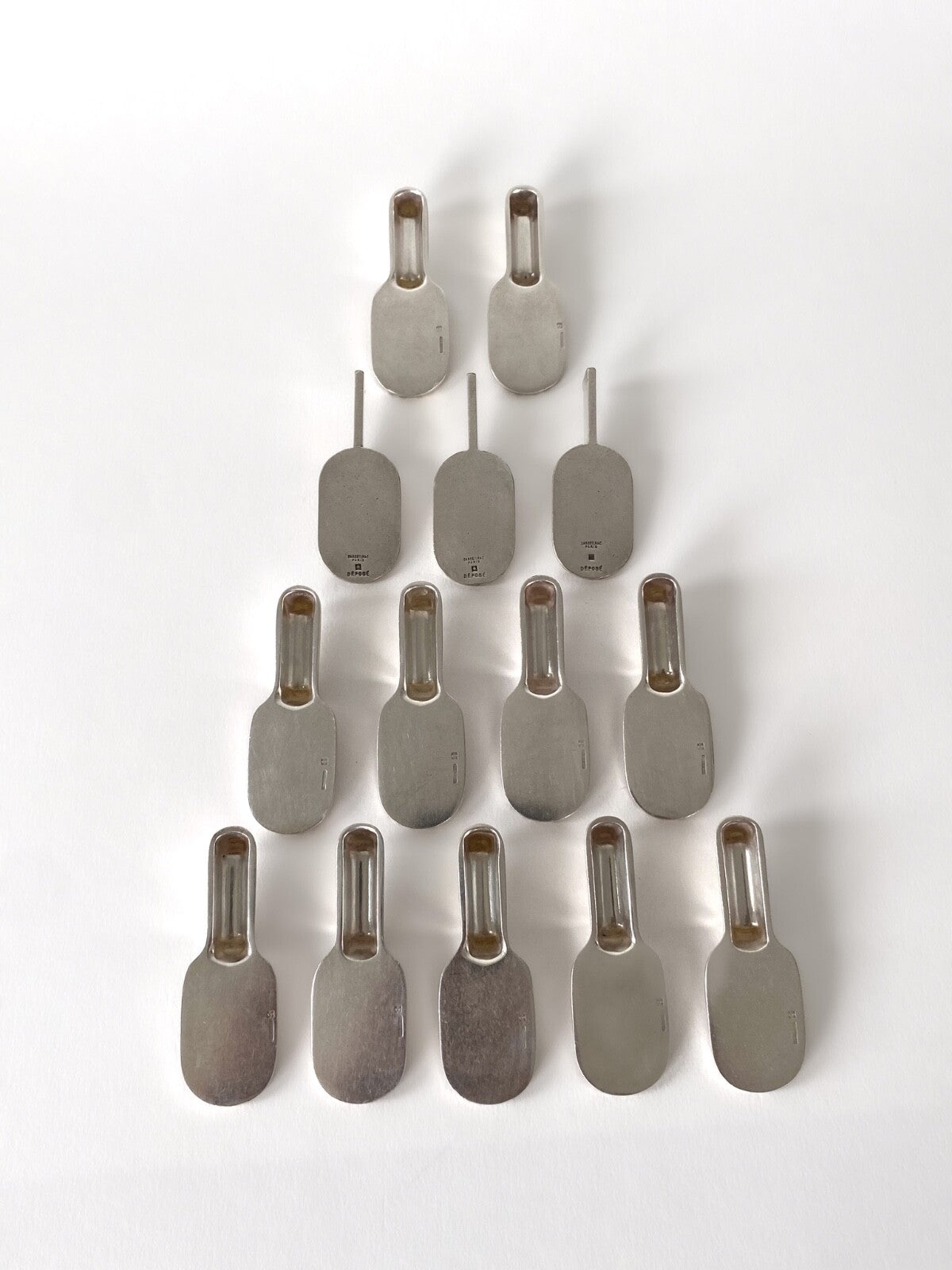 14 porte-couteaux Art Déco "Raquette" par Luc Lanel pour Christofle - 1930s