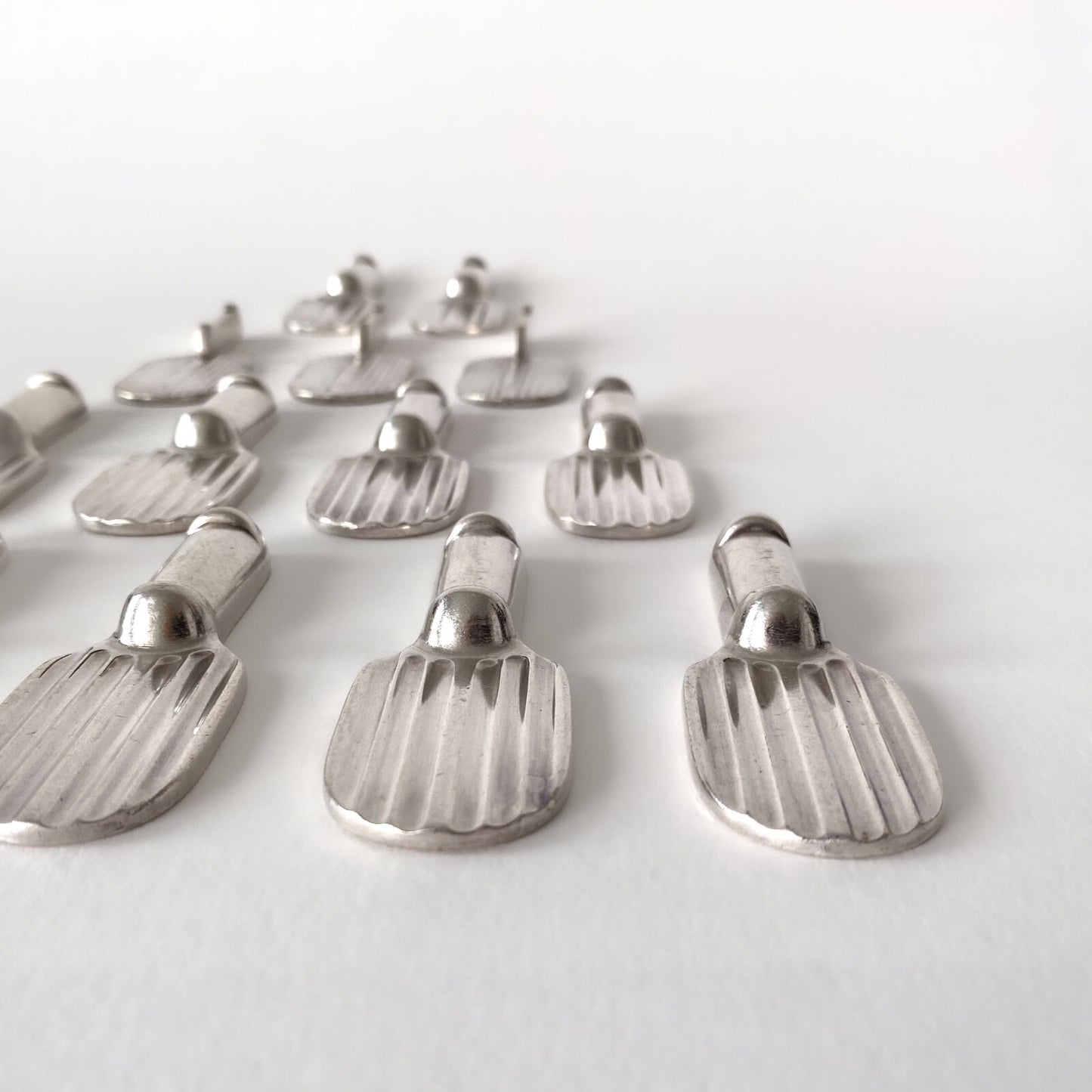 14 porte-couteaux Art Déco "Raquette" par Luc Lanel pour Christofle - 1930s
