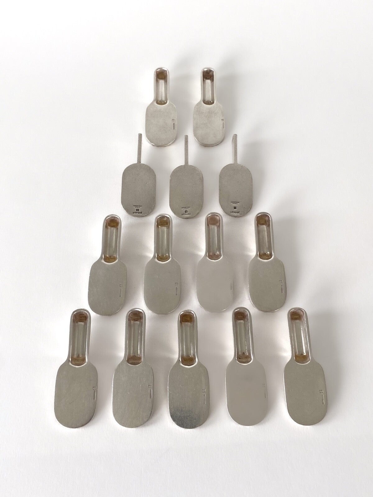 14 porte-couteaux Art Déco "Raquette" par Luc Lanel pour Christofle - 1930s